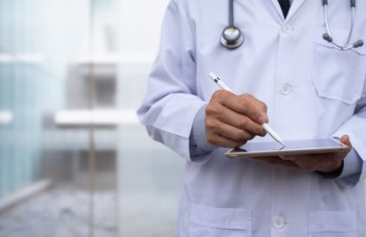 healthcare doctor reviewing electronic patient records