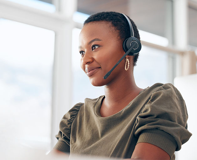 A customer service representative helping a contractor over the phone