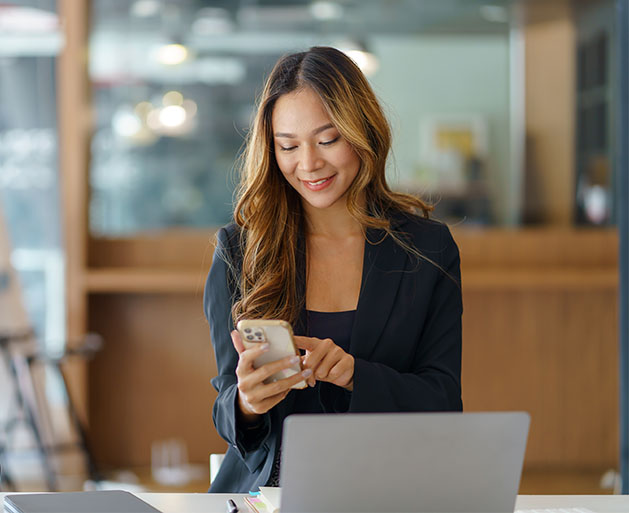 A woman enjoying multi-currency conversion services on her dating app thanks to North's POS services